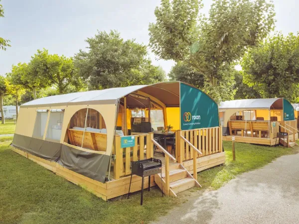 The Roan Lodgetent Holiday has a decking with fixed awning and barbecue/grill plate.