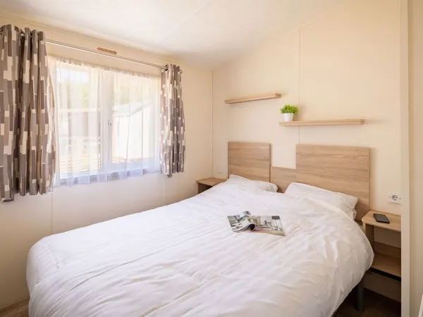 Master bedroom within the Comfort Lounge.