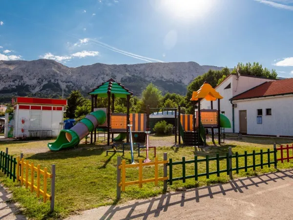 Small playground at Roan camping Baška Camping Resort.
