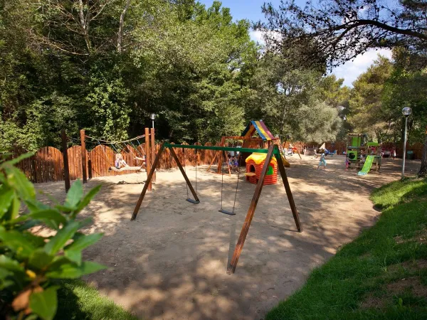 Playground at Roan camping Le Pianacce.