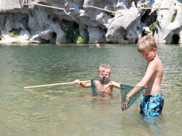 Catch fish in the nearby rivers at Roan camping Le Ranc Davaine.