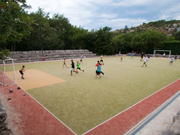 Play soccer on the sports field at Roan camping Le Ranc Davaine.