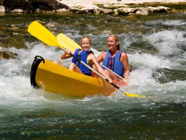 Canoeing in river near Roan camping Le Ranc Davaine.