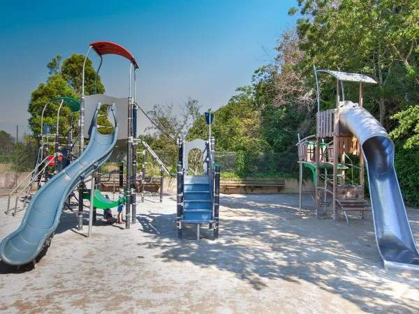 A playground at Roan camping La Sirène.