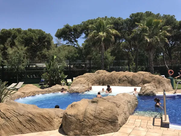 Swimming pool atmosphere image at Roan camping Bella Terra.