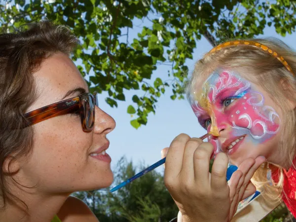 Face painting activity at Roan camping Beach Garden.