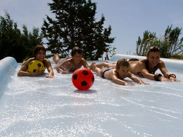 Sliding children at Campground Fabulous.