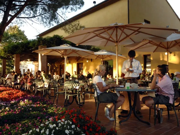 Terrace in the evening at Roan caming Le Capanne.