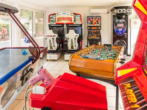 Games arcade at Roan camping Club Napoléon.
