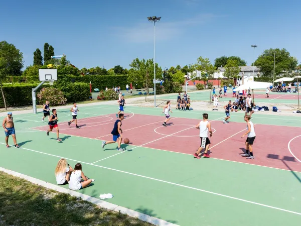 Playing basketball at Roan camping San Francesco.