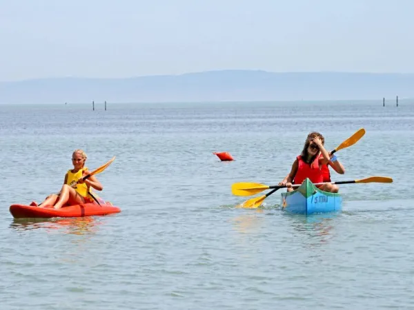 Canoeing by the beach at Roan camping Turistico.