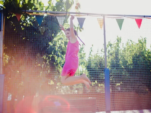 Trampoline jumping at Roan camping Tucan.