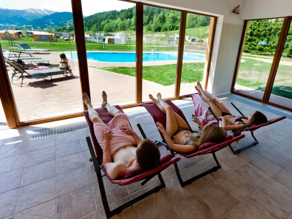 Sunbeds by the pool at Roan camping Bella Austria.