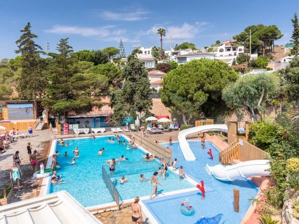Overview of swimming pool at Roan camping Cala Canyelles.