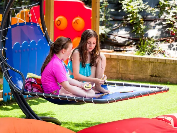 Relax in the playground at Roan camping Altomincio.