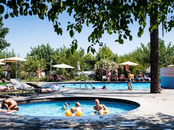 Fun in the pool at Roan Camping El Pinar.