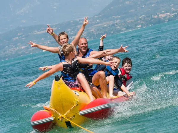 Fun on the banana boat at Roan camping Cisano San Vito.