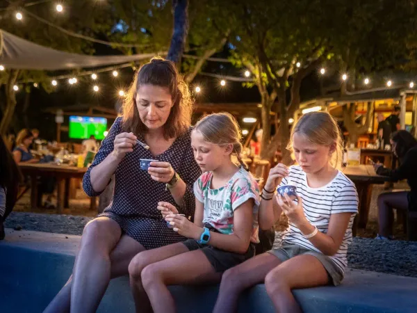 Mother with daughters at Roan camping hu Montescudaio village.