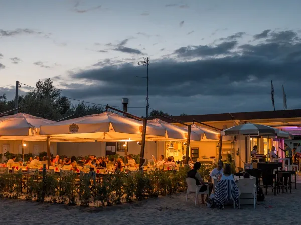 Evening atmosphere terrace near Roan camping Adriano Village.