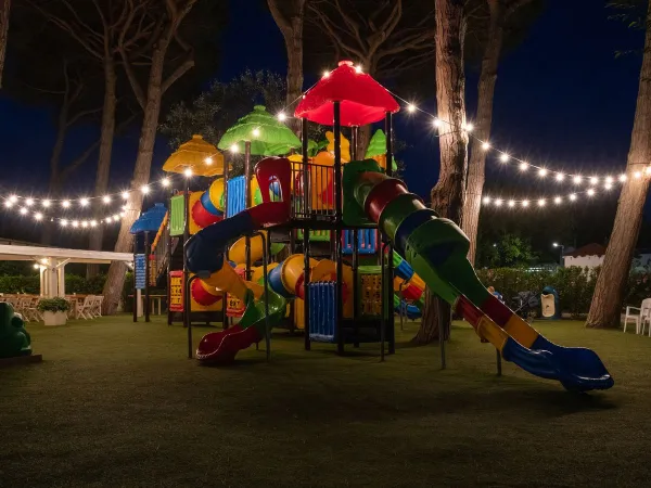 Playground in the dark at Roan camping Adriano Village.