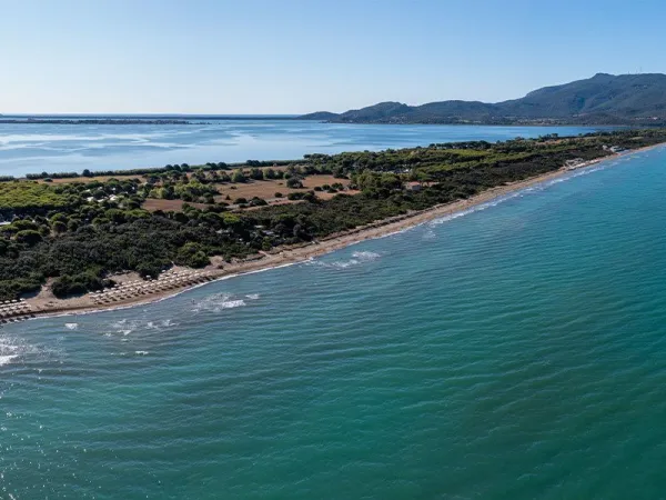 drone shot beach of Orbetello campsite.