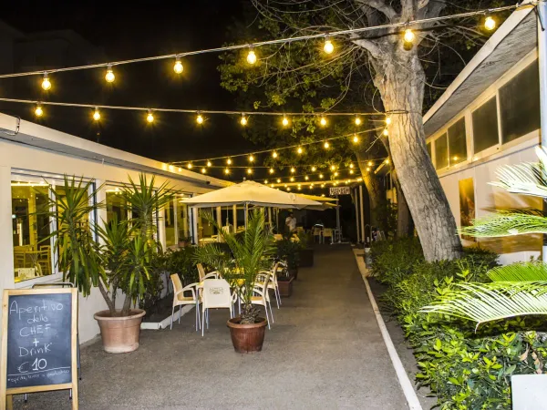 Terrace with lights at Roan camping Rimini Family Village.