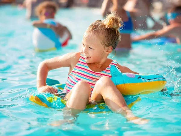 Water fun with child at Roan camping La Grand Terre.