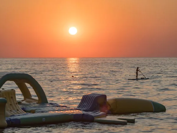 Sunset by the beach at Roan camping Park Umag.