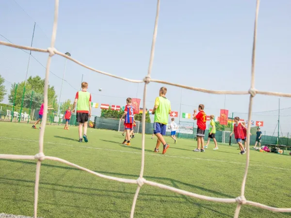 Children playing soccer at Roan camping Marina Di Venetia.