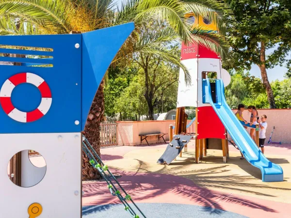 Children's playground at Roan camping La Sardane.