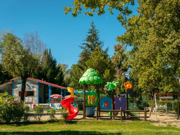 A playground at Roan camping Lido Verbano.