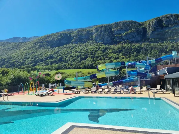 Swimming pool with slides at Roan camping L'Ideal.
