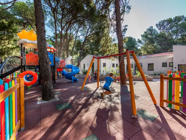 Colorful playground at Roan camping Cikat.
