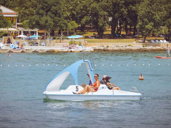 Pedal boats by the beach at Roan camping Park Umag.