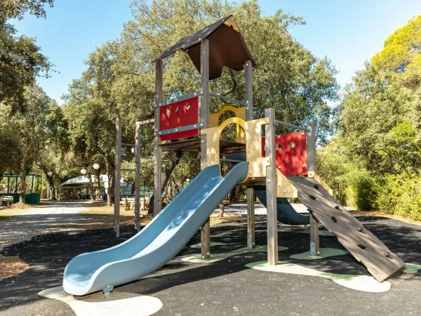 Children's playground at Roan camping Domaine Massereau.