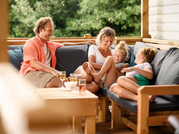 Family fun in the lounge of a Roan accommodation.