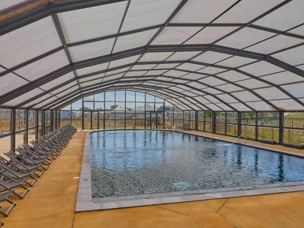 Indoor pool at Roan camping Chardons Bleus.