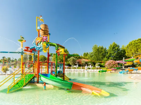 Water playground in lagoon pool at Roan camping Bella Italia.