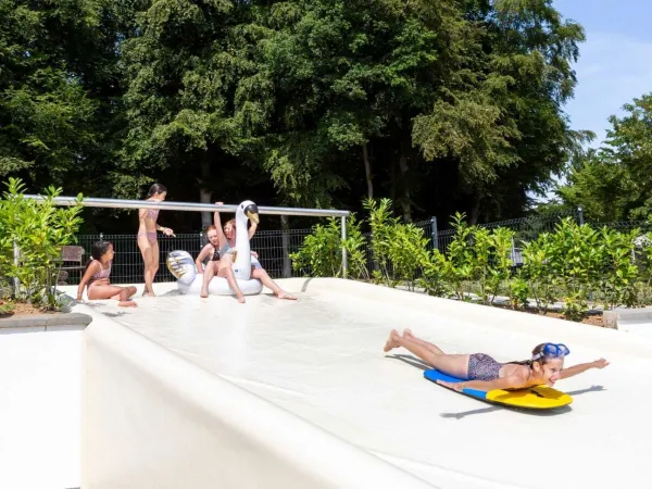 Child off slide at Roan camping Birkelt