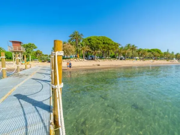 Pier in the sea at Roan camping Playa Montroig.