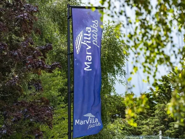 A flag with the logo of Marvilla Parks.