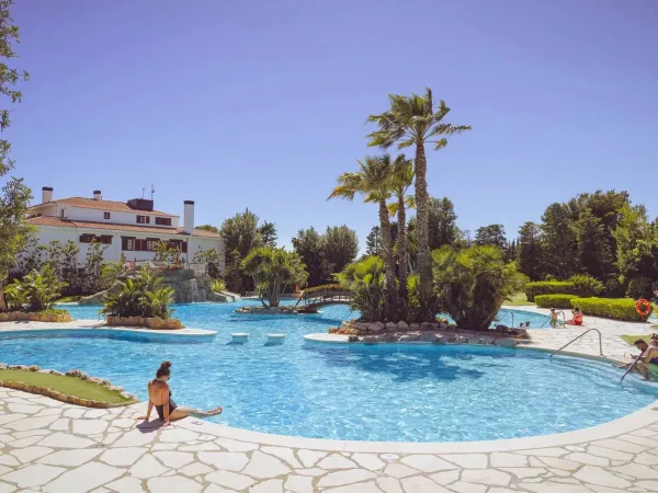 Swim in one of the pools at Roan camping Playa Montroig.