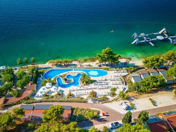 Overview of pool and sea at Roan campsite Amadria Park Trogir.