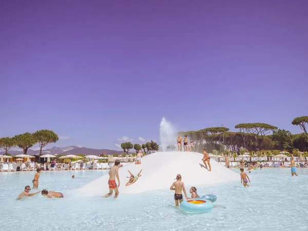 Children have fun in the pool at Roan camping hu Park Albatros village.