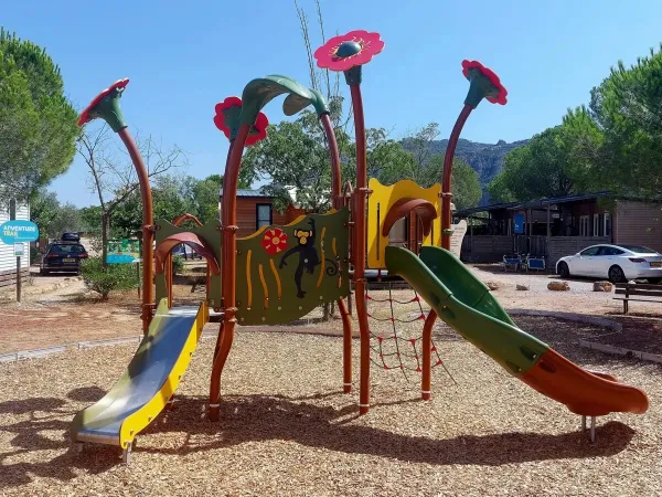 Playground at Roan camping Domaine de la Noguière.