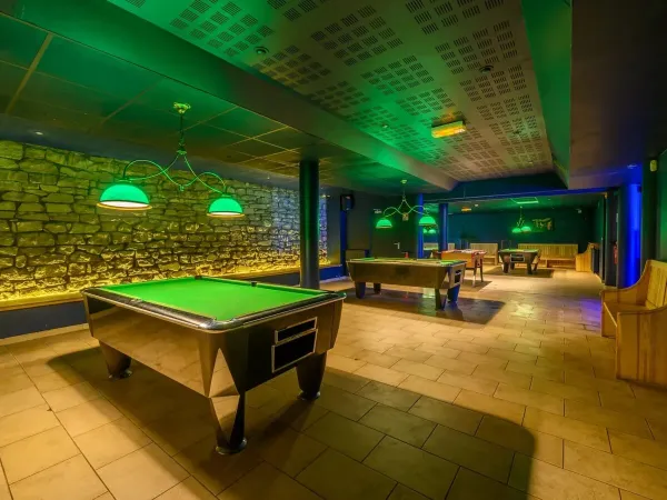 Pool tables at Roan camping La Croix du Vieux Pont.