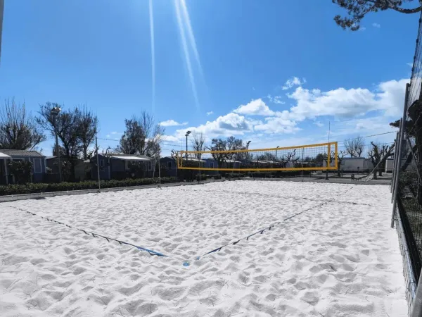 Beach volleyball court at Roan camping Le Castellas.