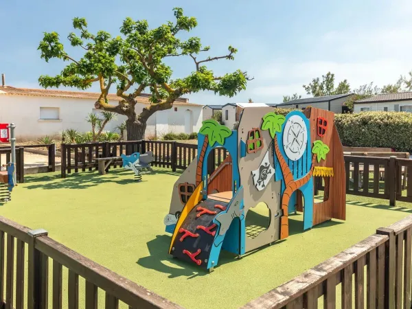 Playground at Roan camping Le Castellas.