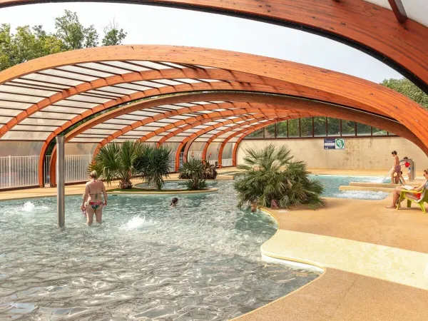Indoor pool at Roan camping Château de Fonrives