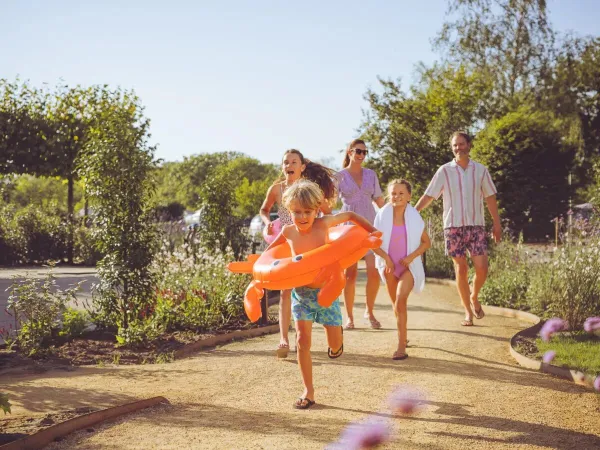 Running to the pool at Roan camping Del Forte.